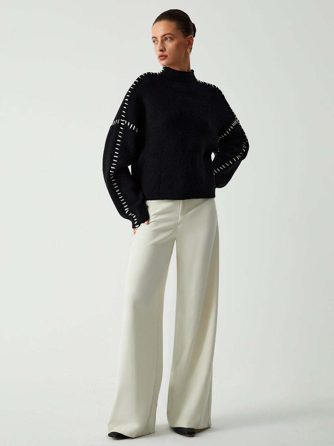 Alma | Suéter oversize de cuello alto en piqué con detalles