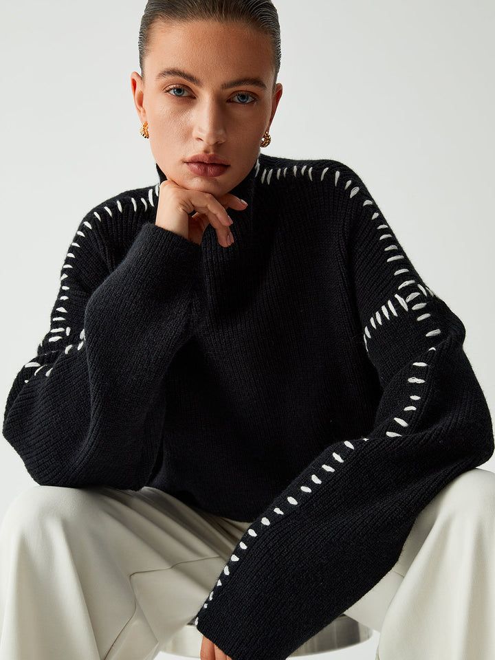 Alma | Suéter oversize de cuello alto en piqué con detalles