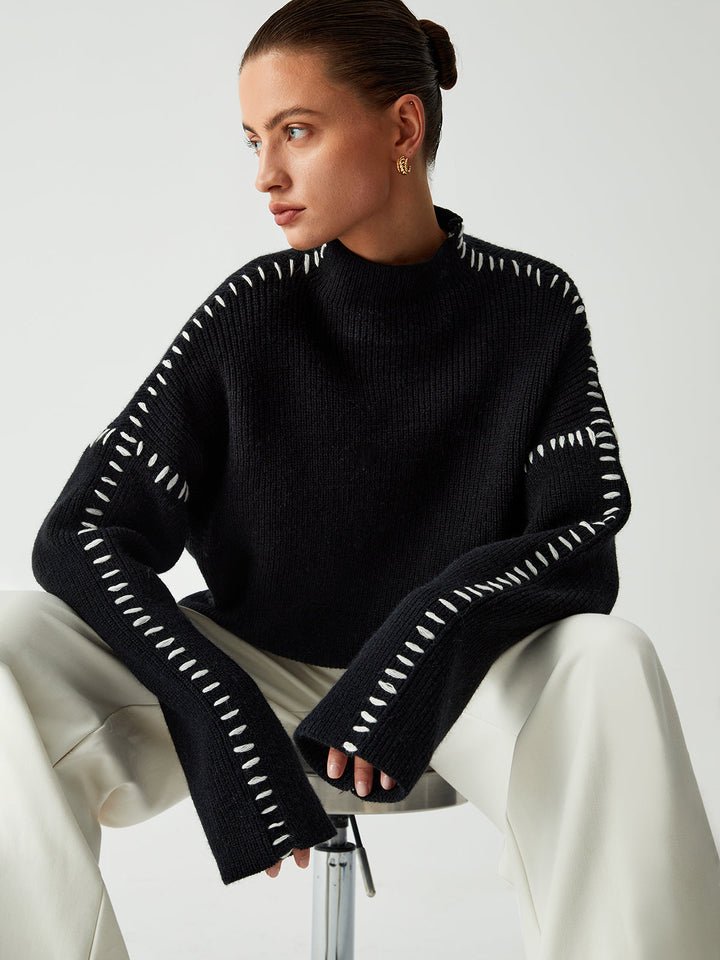 Alma | Suéter oversize de cuello alto en piqué con detalles