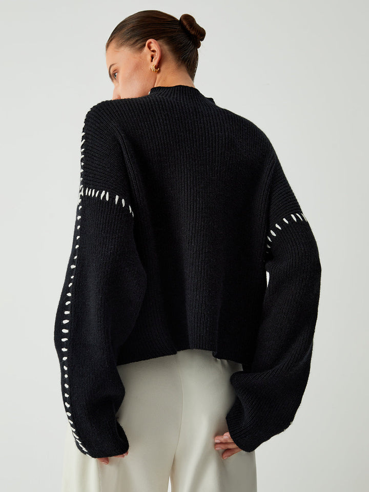 Alma | Suéter oversize de cuello alto en piqué con detalles