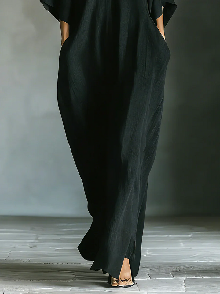 Alejandra | Vestido largo negro oversize minimalista con mangas kimono