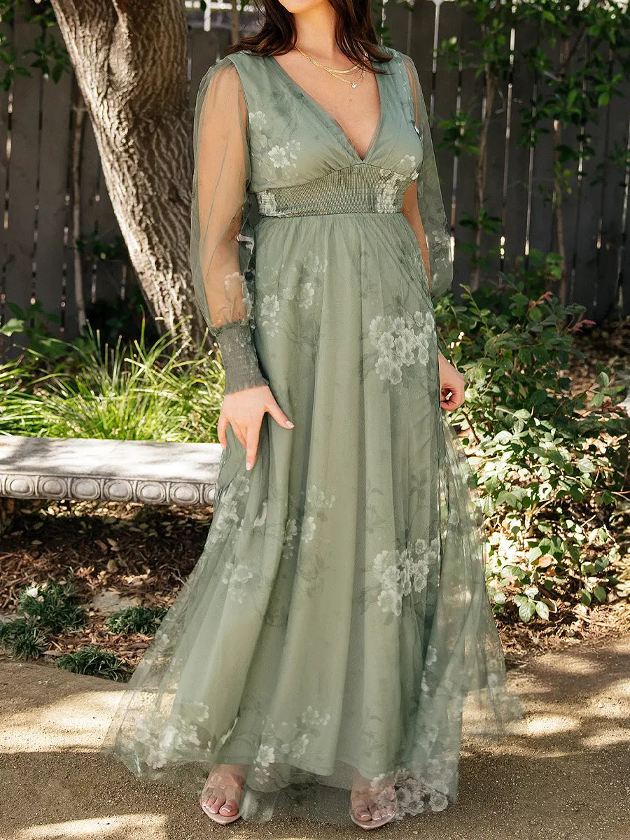 Lirena | Vestido largo fluido con bordado floral y mangas transparentes