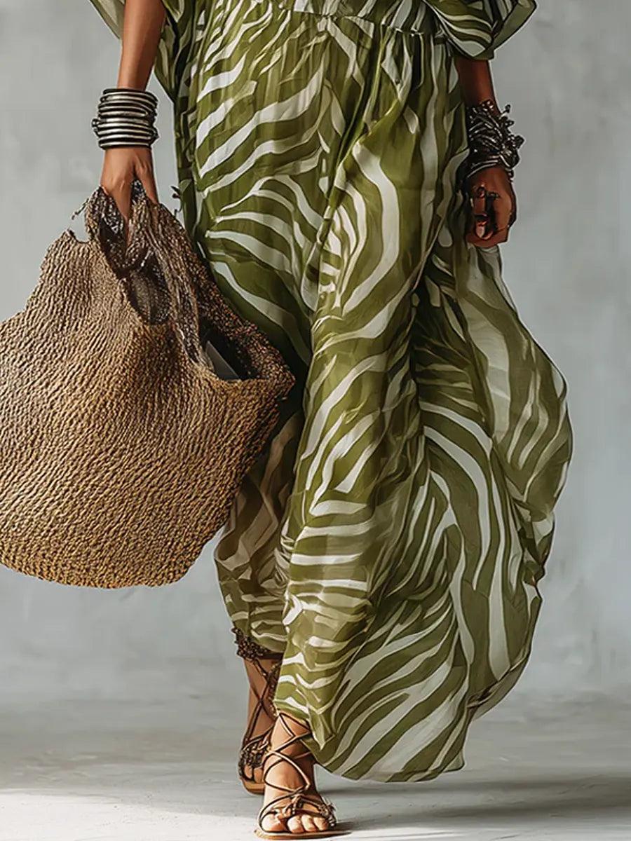 Zarela | Vestido maxi fluido estampado con escote profundo
